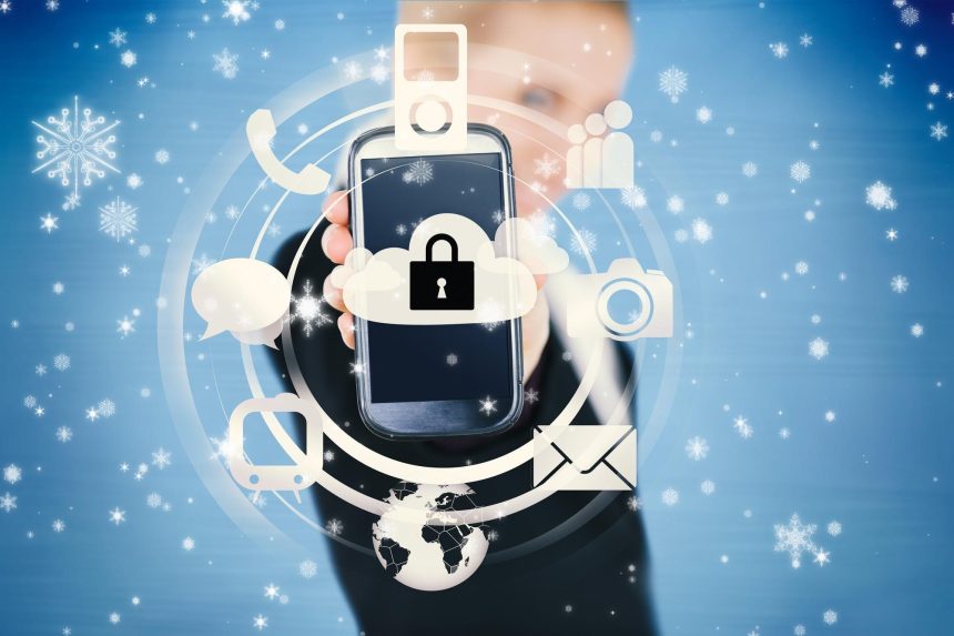 Bizneswoman trzyma zablokowany inteligentny telefon przed padającym śniegiem
