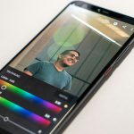 black Android smartphone on white surface