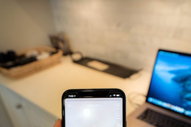 person holding black android smartphone