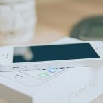 silver iPhone 5s on box