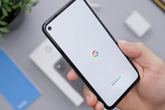 person holding black android smartphone